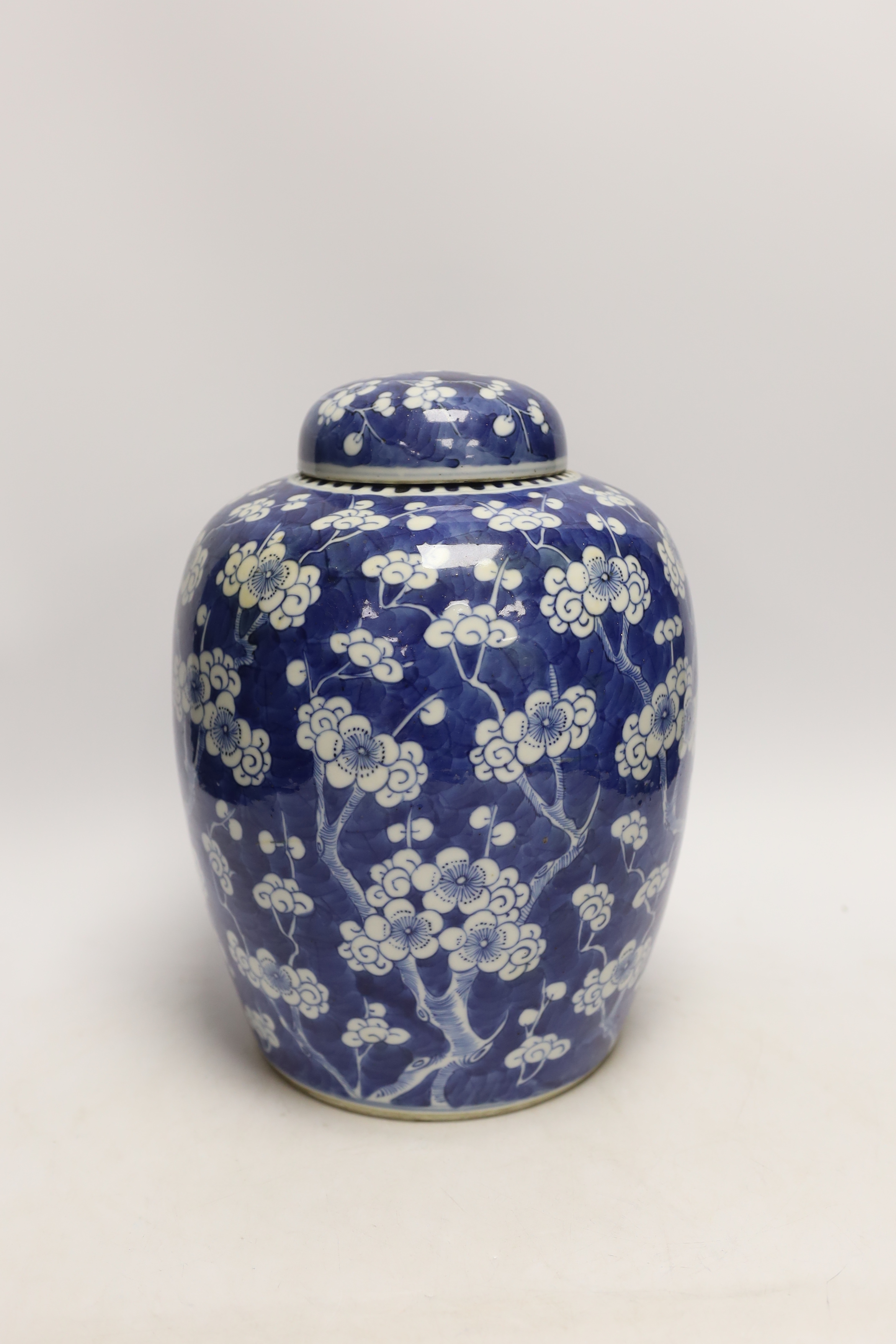 A Chinese blue and white prunus jar and cover, late 19th/early 20th century, 29cm high